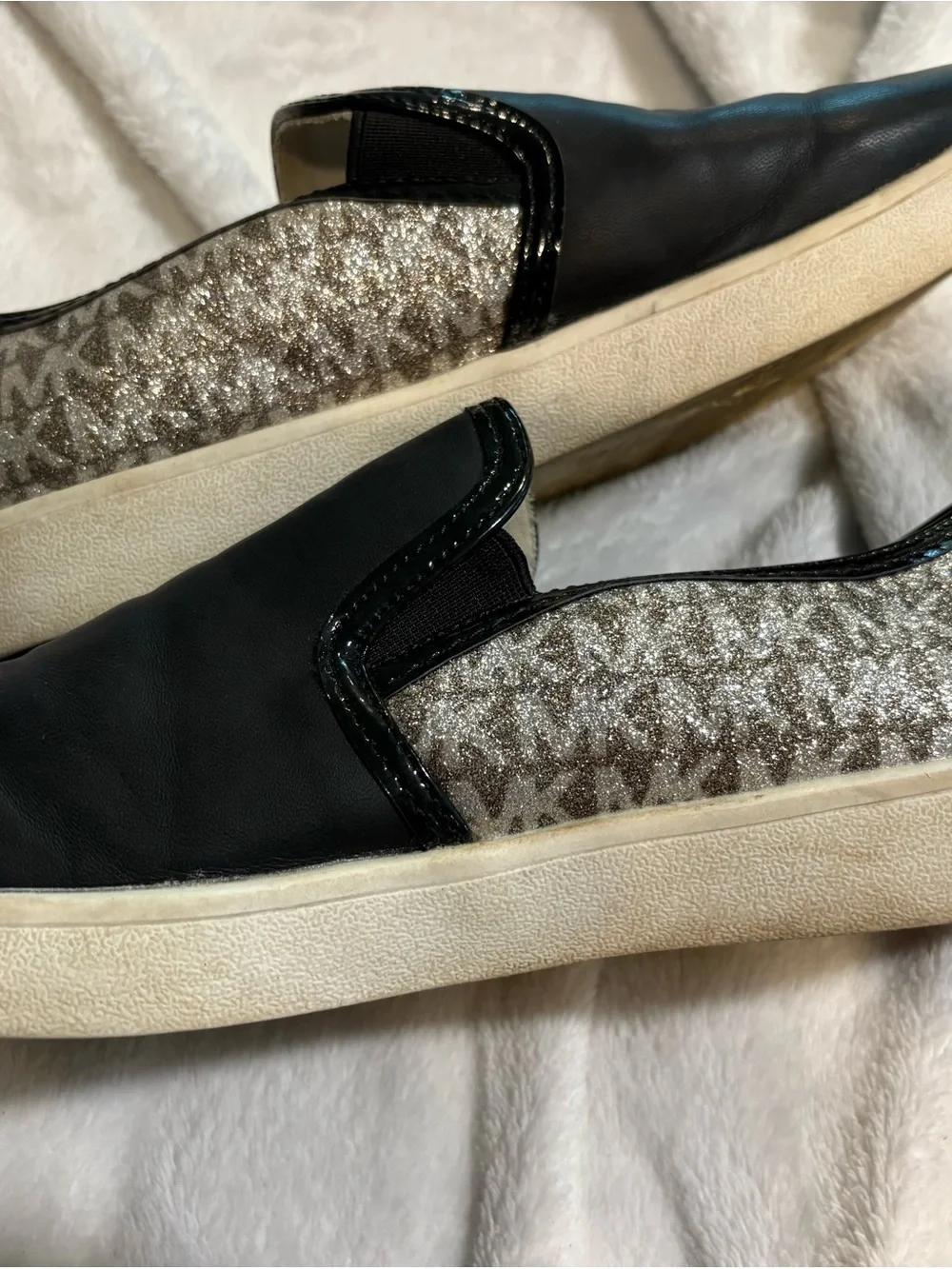 Michael Kors Black Slip-On Sneakers with Metallic MK Monogram